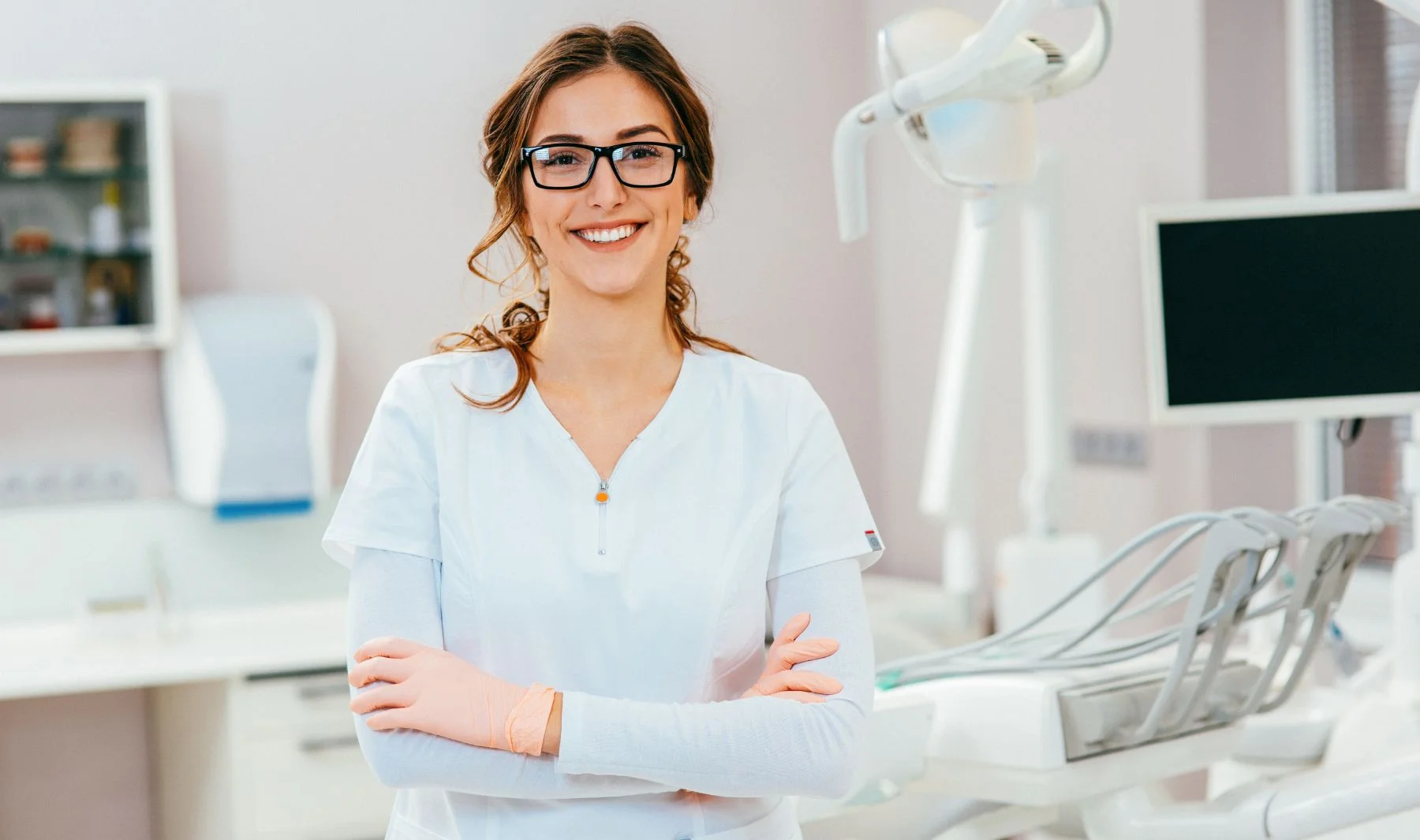 trainee dentist in clinic smiling